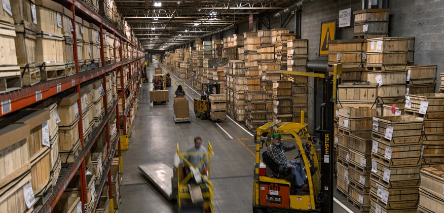 Warehouse with parts in boxes on pallets. 